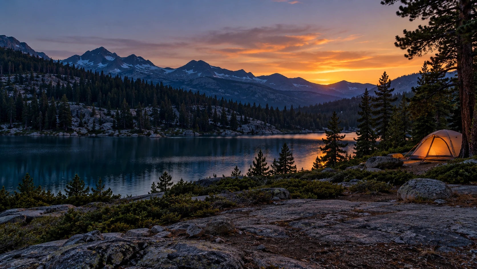 Lakeside campsite at sunset